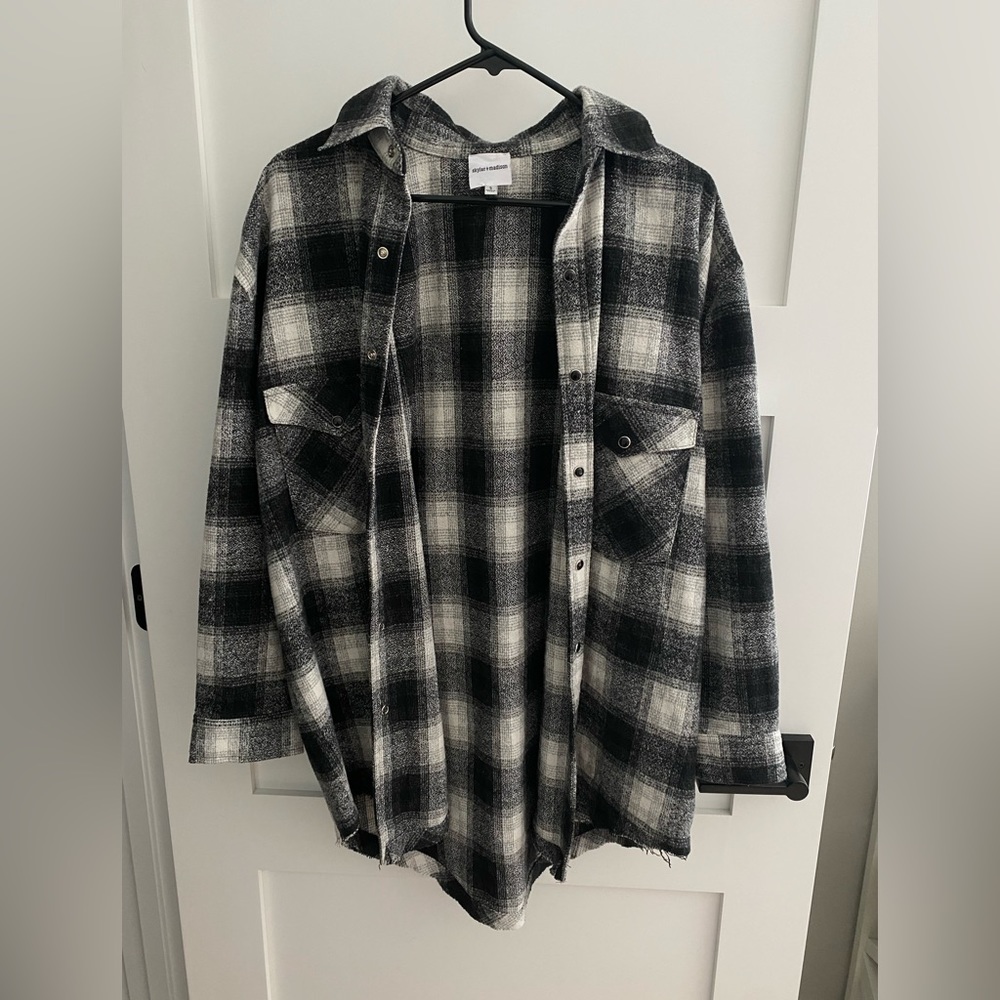 Black and white flannel shacket from Isabelle’s Cabinet!!
